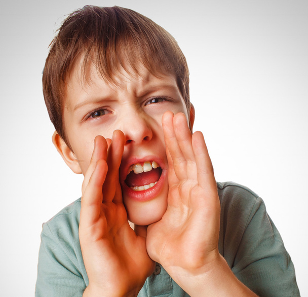 Boy teenager calling cries kids shouts opened his mouth isolated - Photo, Image