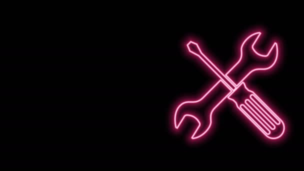 Świecąca neon linia Krzyż śrubokręt i klucz narzędzia ikona izolowane na czarnym tle. Symbol narzędzia serwisowego. 4K Animacja graficzna ruchu wideo - Materiał filmowy, wideo