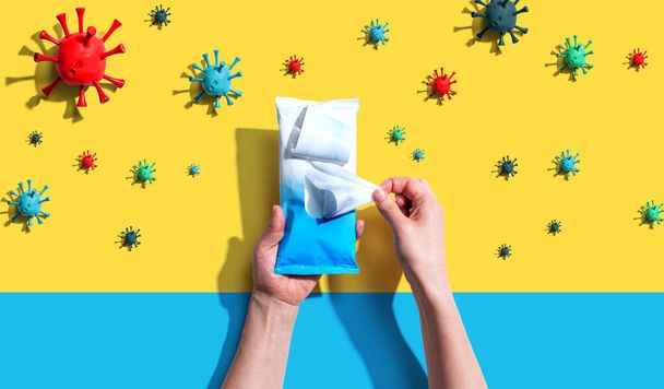 Sanitizer wipe with coronavirus concept - Φωτογραφία, εικόνα