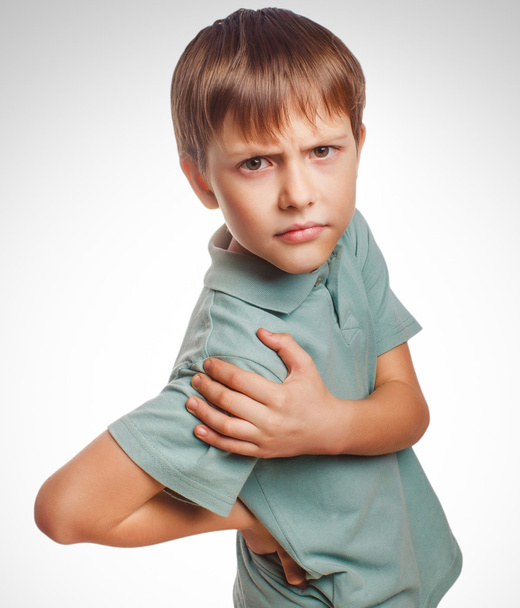 osteochondrosis çocuk genç çocuk isolatd arkasında elinde tutan Merhaba - Fotoğraf, Görsel