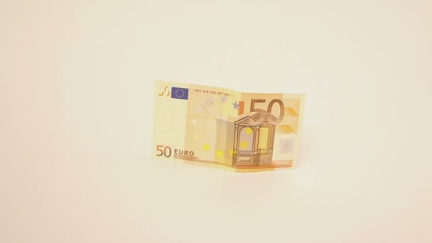 Přiblížit na padesát eurobankovek stojících na boku - Záběry, video