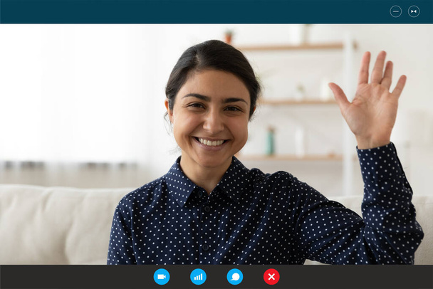 Smiling Indian woman wave talking on video call - Foto, Imagen