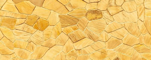 Panorama of Brown stone cladding wall pattern and texture background - Photo, Image