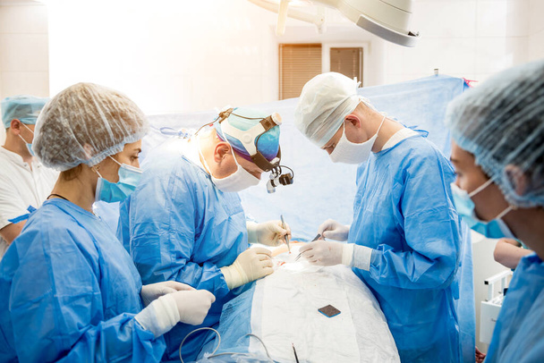 Surgery to remove the breast and replace it with an implant. - Фото, зображення