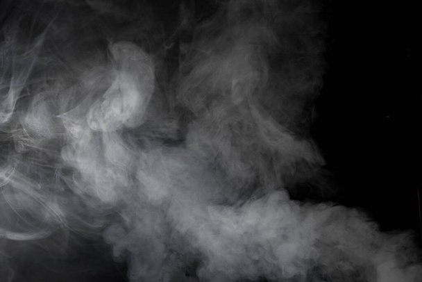 Thick smoke on a black background - Foto, afbeelding