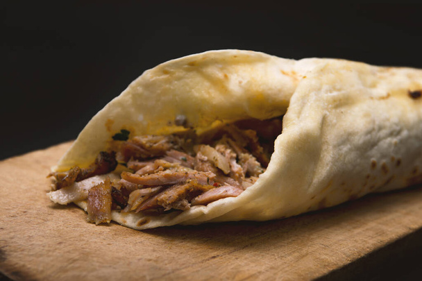 Doner Kebab Gyros Shawarma beef or chicken roll sandwich on wooden background - Photo, Image
