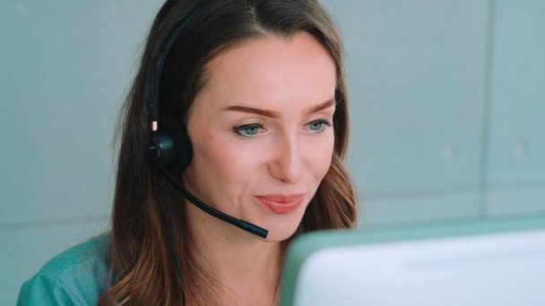 Business people wearing headset working in office - Footage, Video