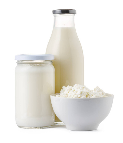 Fresh dairy products milk and cottage cheeese isolated on white - 写真・画像