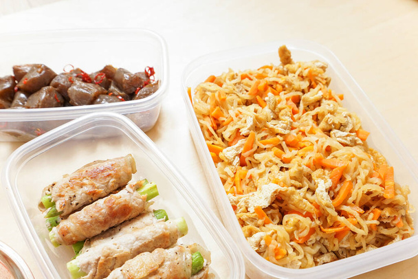 prepared meal in containers served on table - Photo, Image