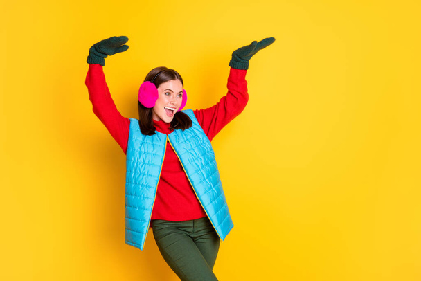 Photo of crazy cool girl enjoy winter season weekend dancing discotheque wear pants sweater isolated over bright color background - 写真・画像