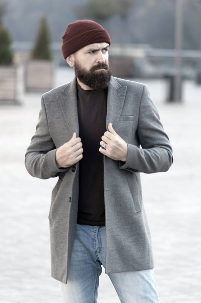 Stylish modern outfit hat bright accessory. Hipster outfit. Stylish casual outfit for fall and winter season. Menswear and male fashion concept. Man bearded hipster stylish fashionable coat and hat - Fotó, kép