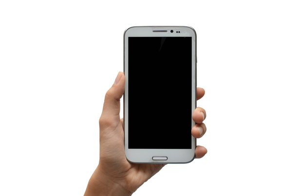 Mujer mano usando la pantalla táctil del teléfono móvil sobre fondo blanco
 - Foto, Imagen