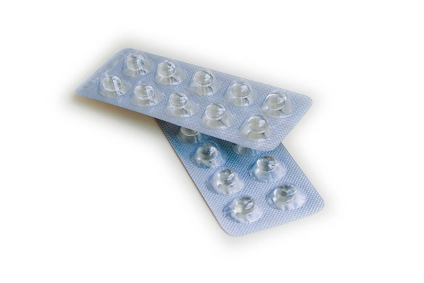 tablets and pills in a blister, standard of small tablets in a package  - Photo, Image