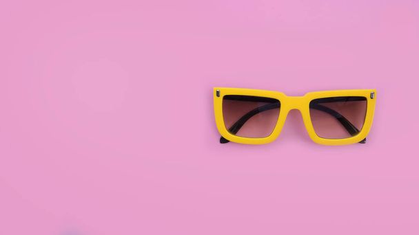 Modern fashionable sunglasses on pink background - Photo, Image
