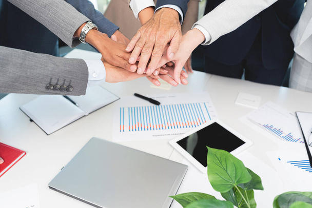 Group of diverse business people stacking hands together at office - Photo, image