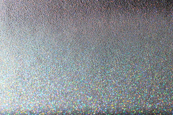 Φωτεινό αφηρημένο glitter υφή σκούρο φόντο με δυναμικό σχεδιασμό  - Φωτογραφία, εικόνα