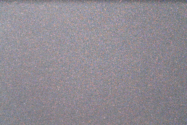 Φωτεινό αφηρημένο glitter υφή σκούρο φόντο με δυναμικό σχεδιασμό  - Φωτογραφία, εικόνα