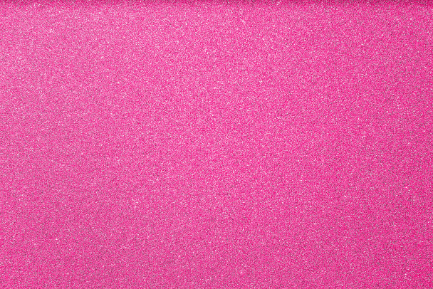 Bright abstract glitter texture rosy background with dynamic design  - Photo, Image