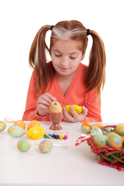 Little girl painting easter eggs - Photo, Image