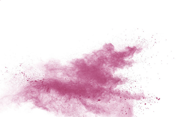 Salpicadura de polvo rosa en el fondo.Explosión de polvo rosa sobre fondo blanco. - Foto, Imagen