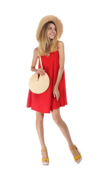 Young woman wearing stylish red dress on white background - Foto, imagen