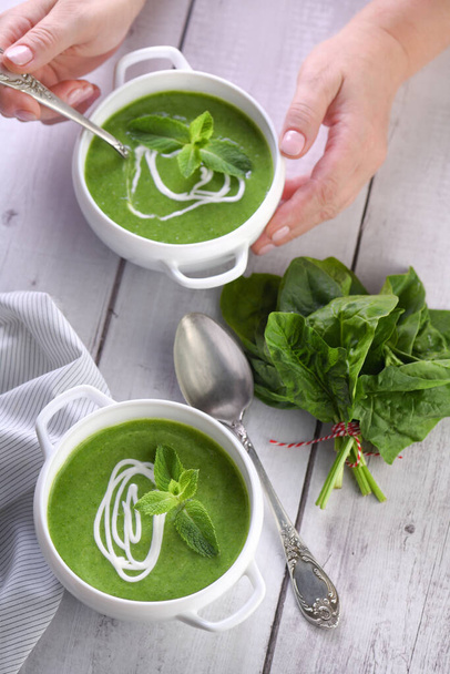 Spinach puree soup seasoned with cream and mint - Photo, Image