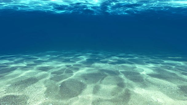 oppervlak van het zand onder water - Foto, afbeelding