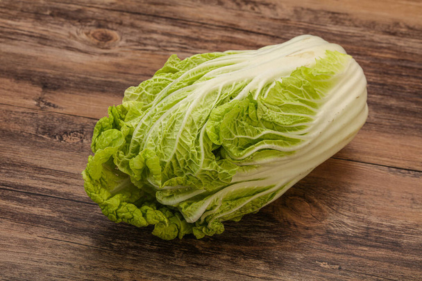 Vegan cuisine - Green fresh tasty Chinese cabbage - Фото, изображение