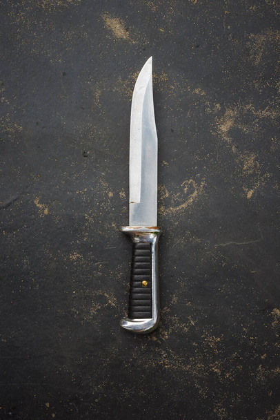 Hunter knife on a dark background - Фото, изображение