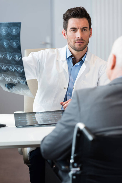 doctor informing the patient on his mri result - Photo, Image