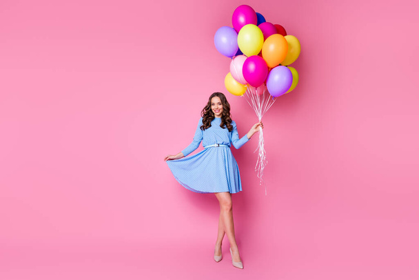 Full length body size view of her she nice attractive cheerful exquisite wavy-haired lady holding in hand bunch balls sale discount shopping shopper isolated pink pastel color background - Foto, imagen