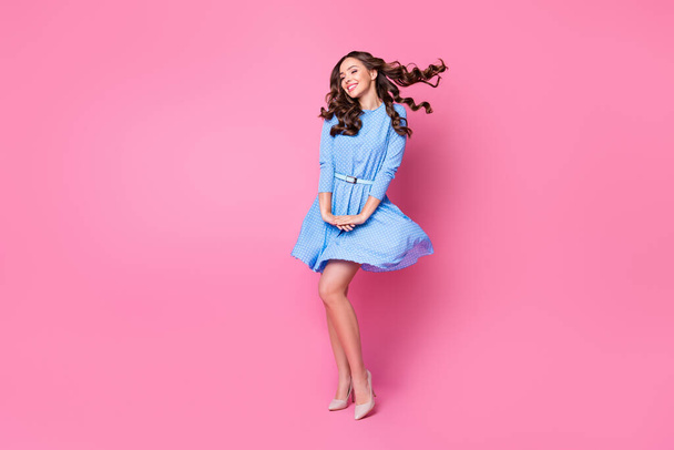Full length body size view of her she nice-looking attractive lovely dreamy cheerful cheery wavy-haired lady posing air blowing mini skirt good weather isolated over pink pastel color background - Photo, Image
