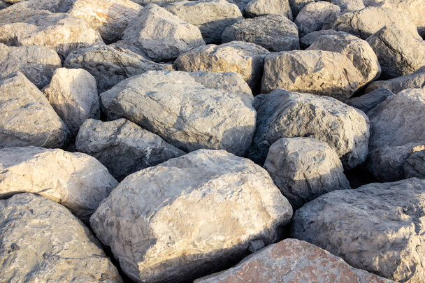 大きな荒石や岩のテクスチャ(背景) 、ドバイで桟橋を形成. - 写真・画像