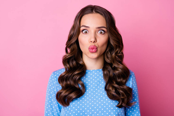 Close-up portrait of her she nice-looking attractive charming lovable feminine funky girlish funny cheery tanned wavy-haired lady sending air kiss isolated over pink pastel color background - Foto, Imagen