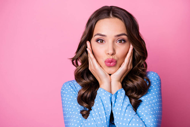 Close-up portrait of her she nice-looking attractive fascinating cheery tanned wavy-haired lady touching cheeks sending air kiss isolated over pink pastel color background - Foto, Imagem