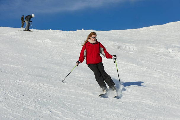 Skiing in the winter snowy slopes - Fotografie, Obrázek