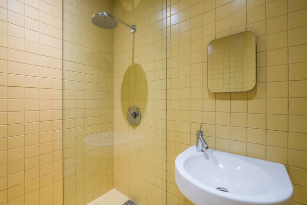 retro stule yellow en-suite bathroom with shower corner - Photo, Image