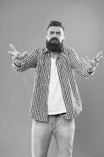 Who are you. Depreciation and neglect. Disregard and disrespect. Bearded hipster brutal person. Bully hipster concept. Arrogant rude hipster man. Communication and gesturing. Expressive manners - Valokuva, kuva