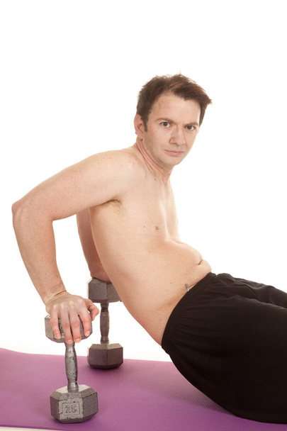 Man weights behind work arms sit - Foto, imagen