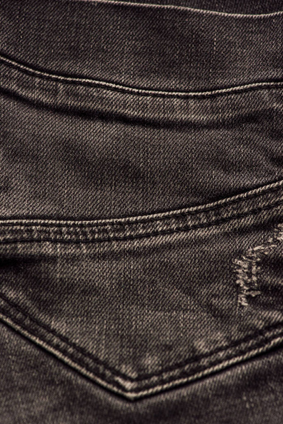 texture tissu denim noir. texture motif tissu de denim ou de jeans noirs pour le fond abstrait design. Jeans noir denim tissu fragment comme une composition de texture de fond - Photo, image