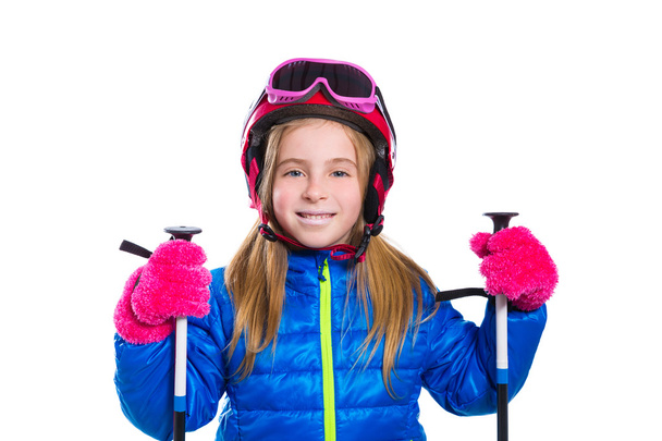 Blond kid girl happy going to snow with ski poles and helmet - 写真・画像