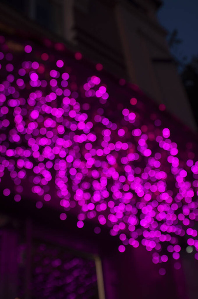 abstract purple bokeh background, night illumination in violet light - Photo, Image