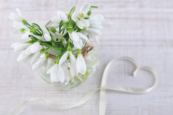 Bouquet of beautiful snowdrops on wooden background - Fotografie, Obrázek