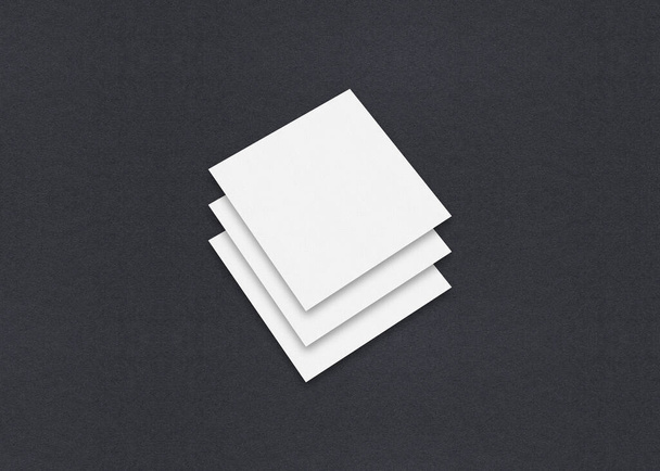 Leere weiße Visitenkarten-Attrappen auf grauem strukturiertem Papierhintergrund. - Foto, Bild