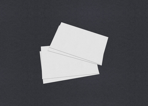 Prázdné bílé vizitka mockup zásobníky na šedém texturovaném papíře pozadí. - Fotografie, Obrázek