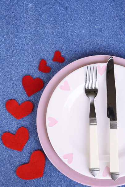 Valentines day dinner with table setting on blue background - Foto, Imagen