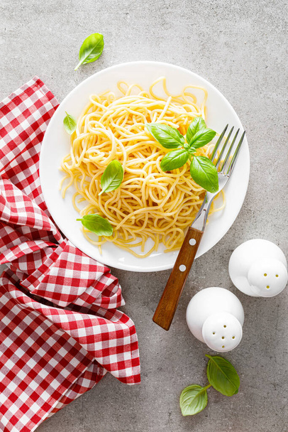 Pasta. Traditional italian food. Vermicelli with fresh basil - Photo, Image