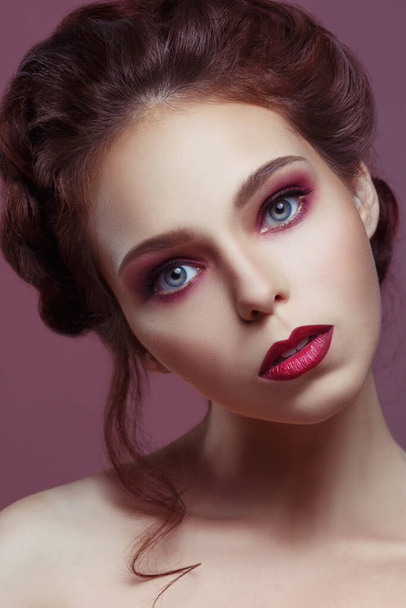 Beauty portrait of beautiful girl with languid gothic make-up on a violet background - Valokuva, kuva