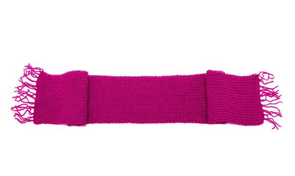 Pink knitted scarf on a white background. - Photo, Image