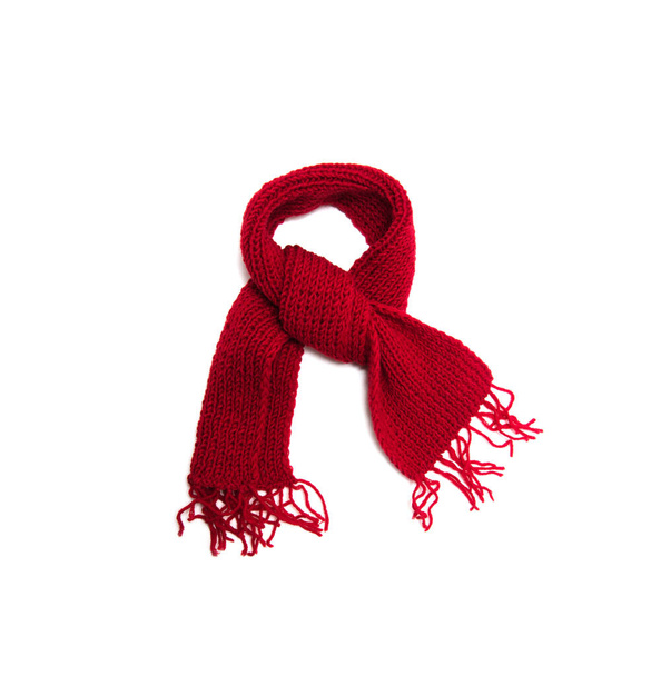 Red knitted scarf on a white background. - Fotografie, Obrázek